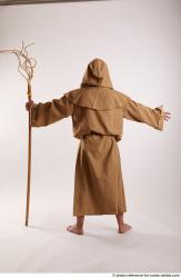 JOEL_ADAMSON STANDING POSE WITH A MAGIC STICK